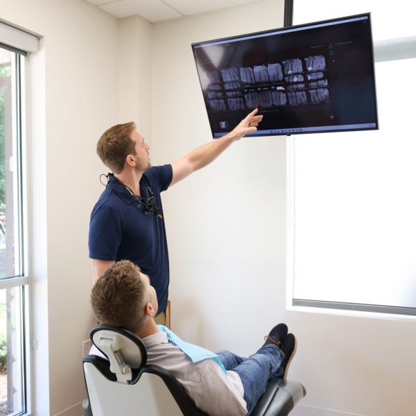 dr showing patient xrays