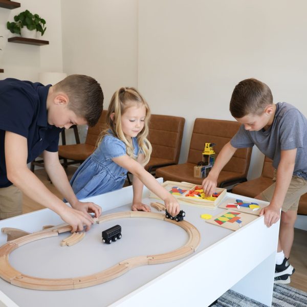 kids at the train table
